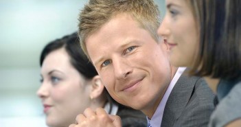 smiling businessman in a meeting